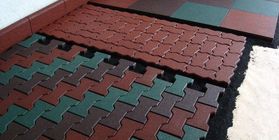 The production of tiles and paving stones of crumb rubber
